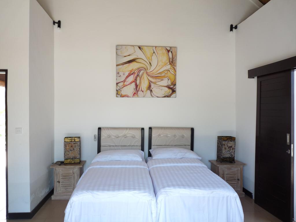 Taman Dewi Sri Villa Et Bungalow Pemuteran Pokoj fotografie